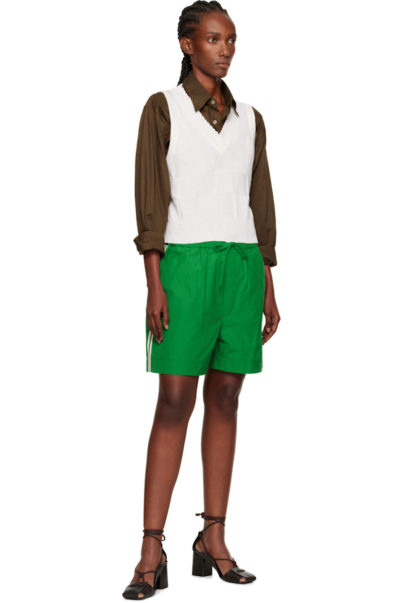 Cotton-blend taffeta shorts.

· Certified ISO 9001 and ZDHC
· Drawstring at elasticized waistband
· Two-pocket styling
· Mock fly
· Stripes at outseams

Supplier color: Fento
