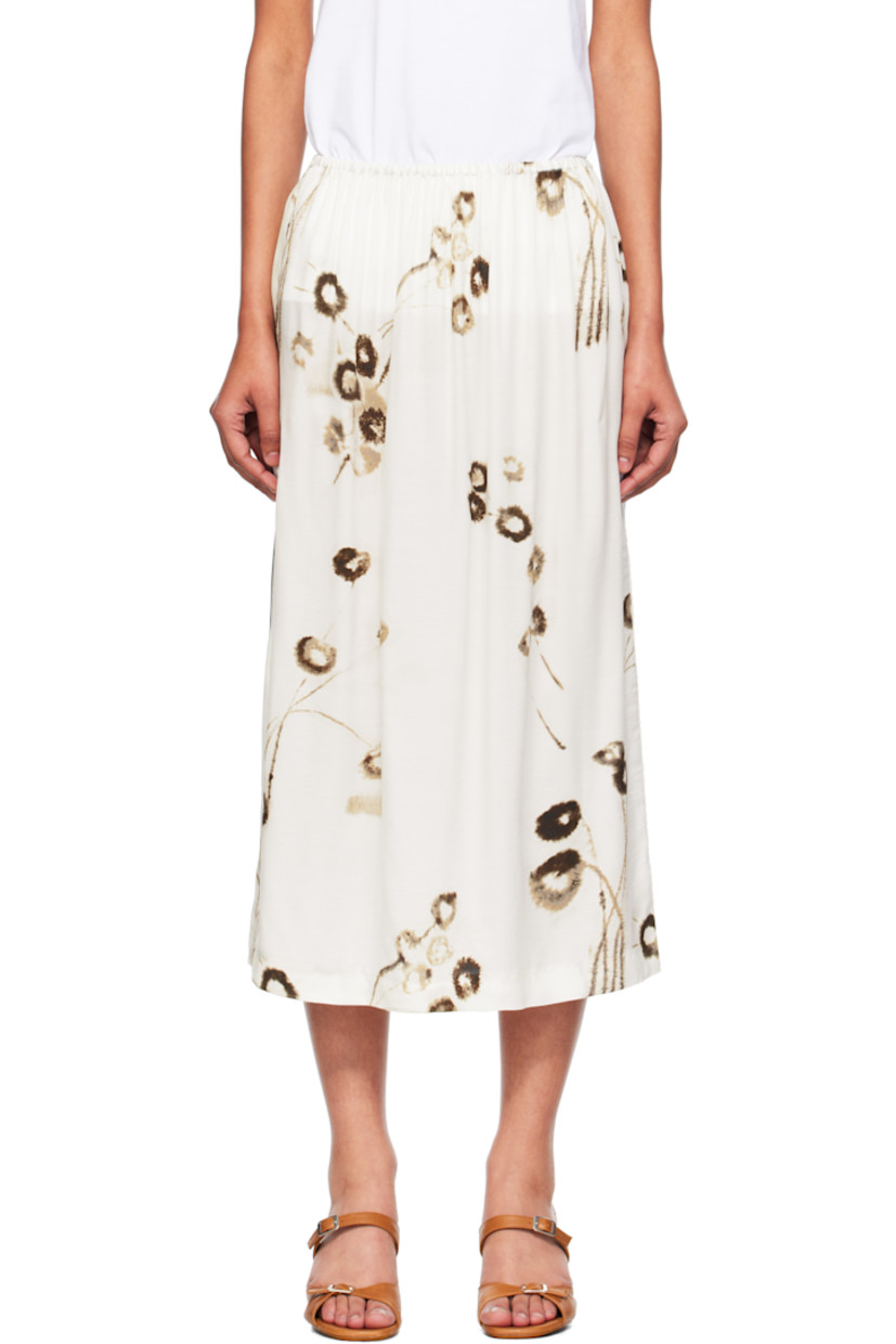 Viscose- and ECOVERO™ viscose-blend satin midi skirt. 

· Graphics printed throughout 
· Elasticized waistband
· Slit at side hem
· Lace trim at side

Supplier color: Floral