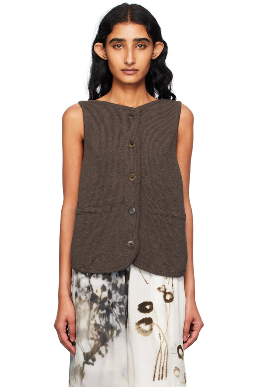 Knit ECOTEC® recycled cotton-blend cardigan.

· GRS- and OEKO-TEX® Standard 100-certified
· Boatneck
· Button closure
· Mock welt pockets at front
· Shirttail hem 
· Logo-engraved hardware

Supplier color: Brown