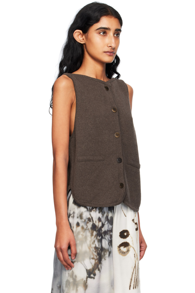 Knit ECOTEC® recycled cotton-blend cardigan.

· GRS- and OEKO-TEX® Standard 100-certified
· Boatneck
· Button closure
· Mock welt pockets at front
· Shirttail hem 
· Logo-engraved hardware

Supplier color: Brown