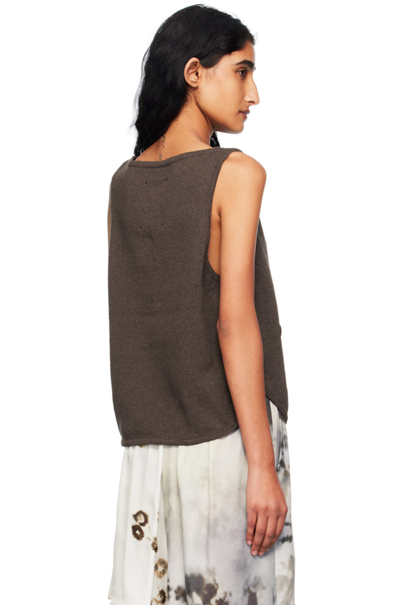 Knit ECOTEC® recycled cotton-blend cardigan.

· GRS- and OEKO-TEX® Standard 100-certified
· Boatneck
· Button closure
· Mock welt pockets at front
· Shirttail hem 
· Logo-engraved hardware

Supplier color: Brown