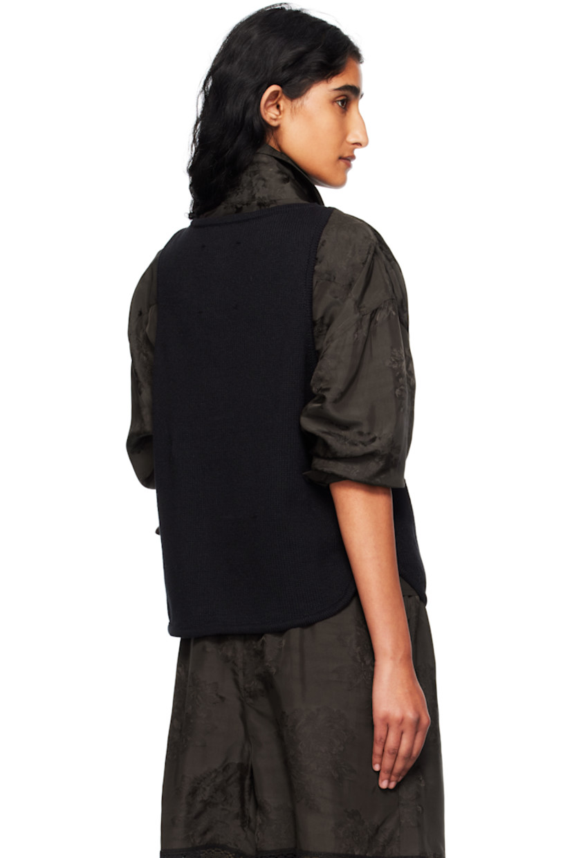 Knit ECOTEC® upcycled cotton-blend cardigan

· GRS- and OEKO-TEX 100-certified
· Boatneck
· Button closure
· Mock welt pockets at front
· Shirttail hem
· Logo-engraved hardware

Supplier color: Black