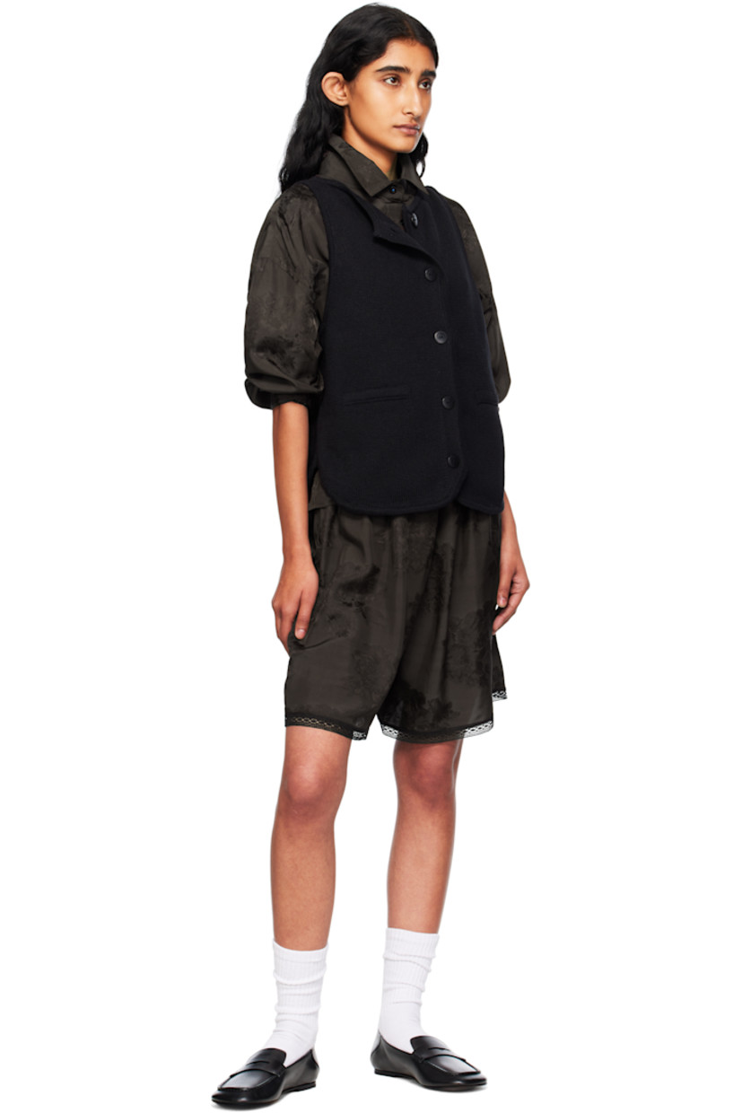 Knit ECOTEC® upcycled cotton-blend cardigan

· GRS- and OEKO-TEX 100-certified
· Boatneck
· Button closure
· Mock welt pockets at front
· Shirttail hem
· Logo-engraved hardware

Supplier color: Black
