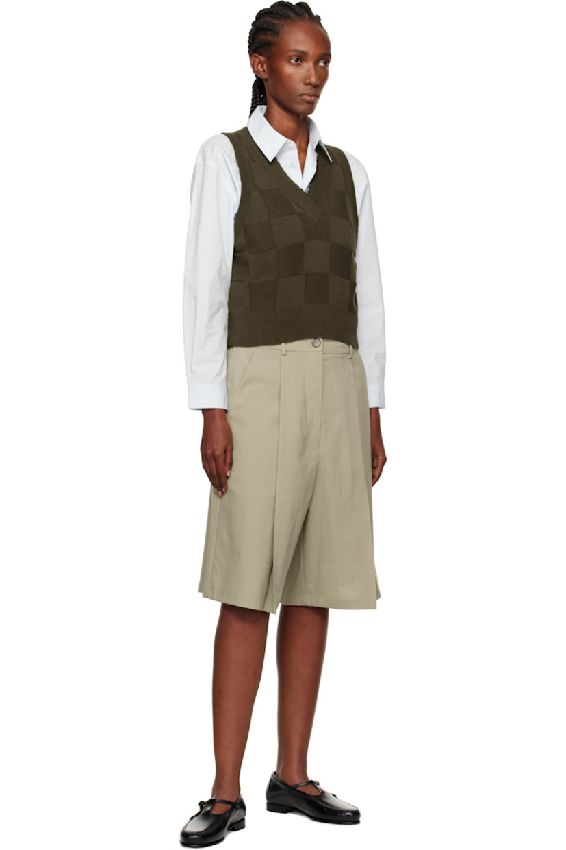 Knit cotton- and cashmere-blend vest.

· Certified OEKO-TEX® Standard 100, ZDHC, BCI
· Check pattern throughout
· Rib-knit V-neck, hem, and armscyes
· Scalloped edge at V-neck
· Cropped hem

Supplier color: Dark moss