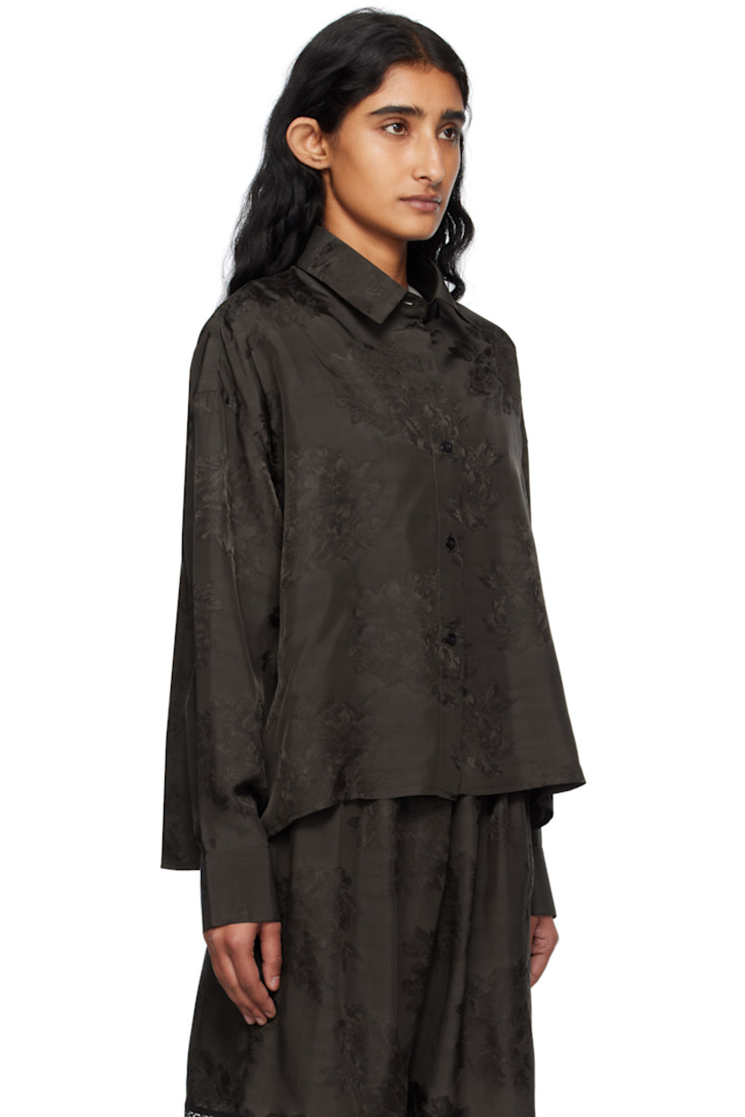 Viscose damask shirt. 

· Jacquard floral pattern throughout 
· Spread collar
· Button closure
· Cropped droptail hem 
· Dropped shoulders
· Buttoned barrel cuffs
· Twin pleats at back yoke 
· Logo-engraved hardware

Supplier color: Dark brown