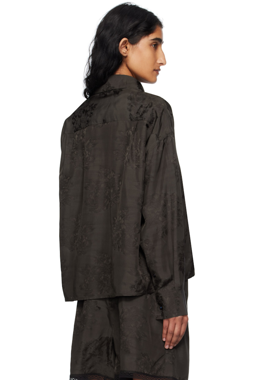 Viscose damask shirt. 

· Jacquard floral pattern throughout 
· Spread collar
· Button closure
· Cropped droptail hem 
· Dropped shoulders
· Buttoned barrel cuffs
· Twin pleats at back yoke 
· Logo-engraved hardware

Supplier color: Dark brown