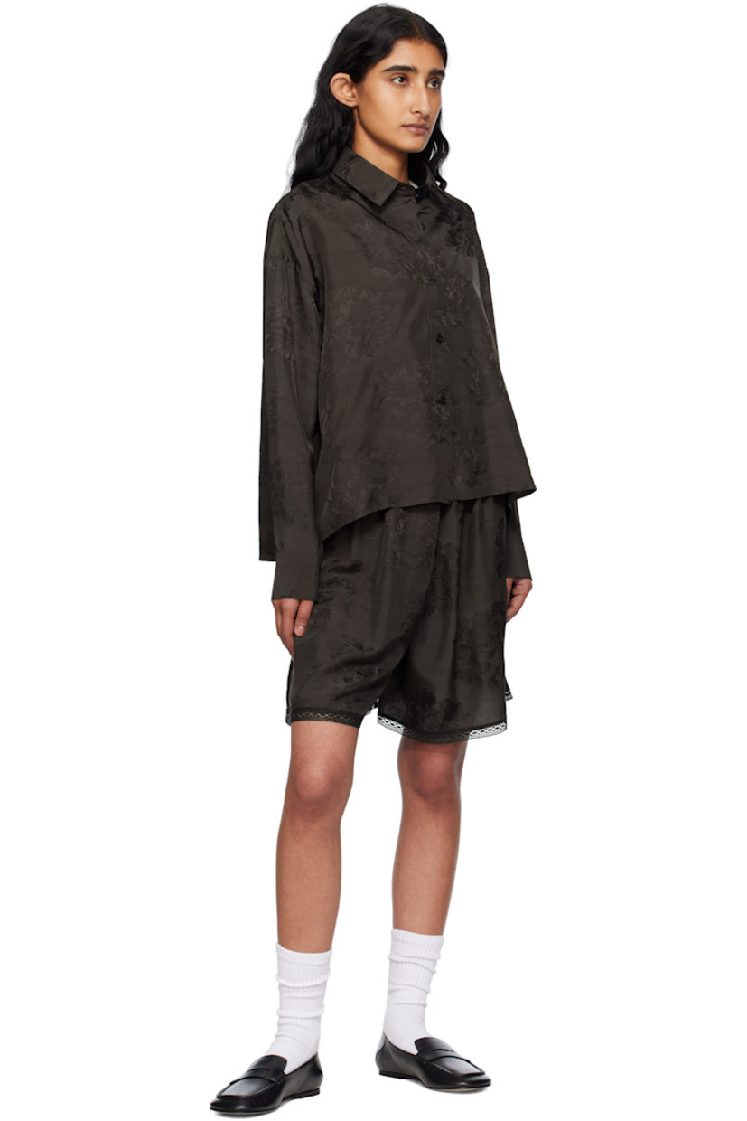 Viscose damask shirt. 

· Jacquard floral pattern throughout 
· Spread collar
· Button closure
· Cropped droptail hem 
· Dropped shoulders
· Buttoned barrel cuffs
· Twin pleats at back yoke 
· Logo-engraved hardware

Supplier color: Dark brown
