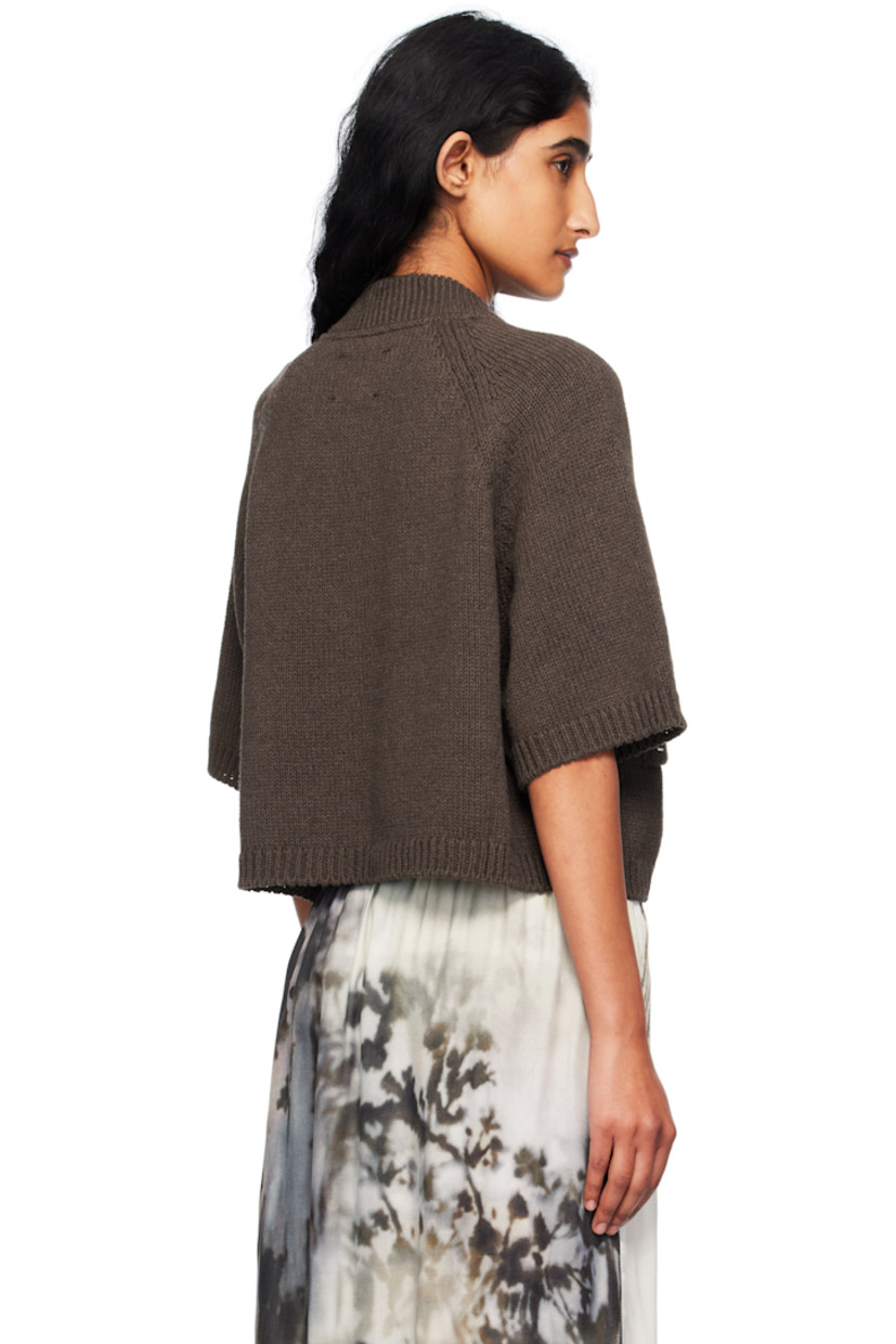 Knit ECOTEC® upcycled cotton-blend cardigan. 

· Certified GOTS and OEKO-TEX® Standard 100
· Rib-knit stand collar, hem, and cuffs
· Button closure
· Topstitching in white at front
· Patch pockets at waist
· Raglan sleeves
· Logo-engraved hardware

Supplier color: Brown