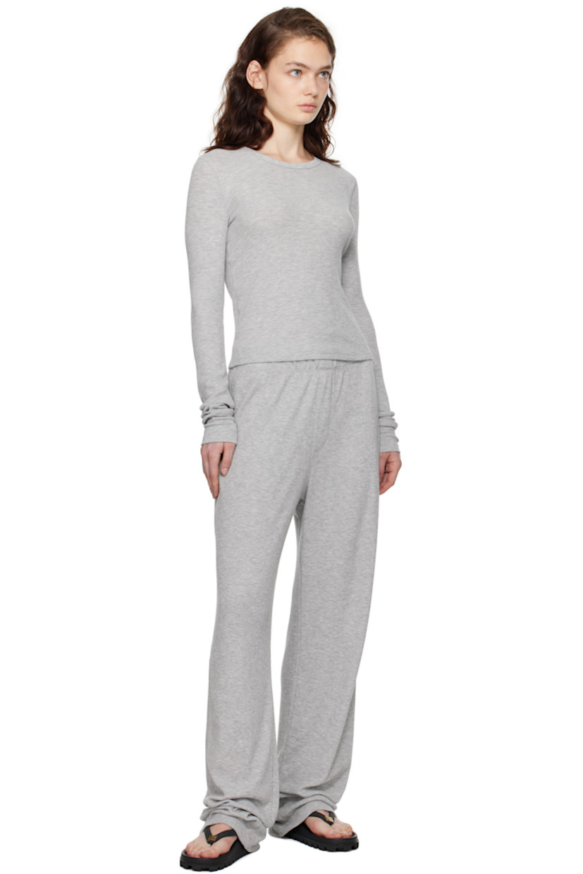Waffle-knit stretch cotton- and modal-blend lounge pants.

· Relaxed-fit and wide-leg
· Elasticized waistband

Supplier color: Heather grey