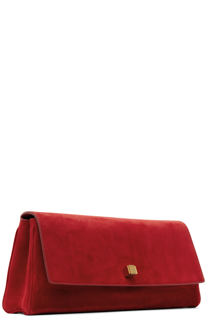 Calfskin suede clutch in red.

· Logo stamp at back face
· Graphic hardware at magnetic flap 
· Card slot at interior
· Grained leather lining
· Logo-engraved antiqued gold-tone hardware
· H5.5" x W12" x D2.5"

Supplier color: Rebel suede