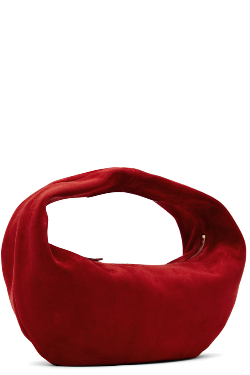Kidskin suede shoulder bag in red.

· Integrated shoulder strap
· Logo embossed at face
· Zip closure
· Grained leather lining
· Logo-engraved gold-tone hardware
· H9" x W15" x D3"
· Total height: H13"

Supplier color: Rebel suede