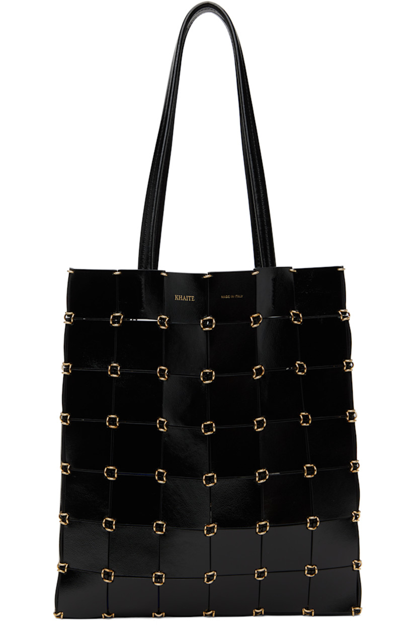 Handcrafted chain-mail-style patent leather tote in black.

· Rolled shoulder straps
· Gold-tone logo stamp at face
· Open throat
· Suede interior
· H11" x W9.75" x D2"

Supplier color: Black