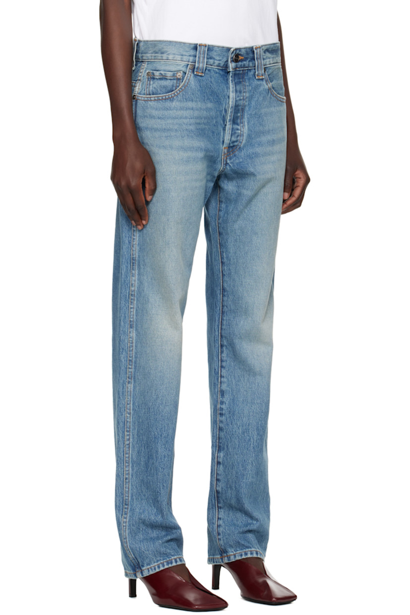 Tapered non-stretch denim jeans. Fading, whiskering, and distressing throughout.

· Low-rise
· Belt loops
· Five-pocket styling
· Button fly
· Logo-engraved gunmetal-tone hardware
· Contrast stitching in tan

Supplier color: Heath
