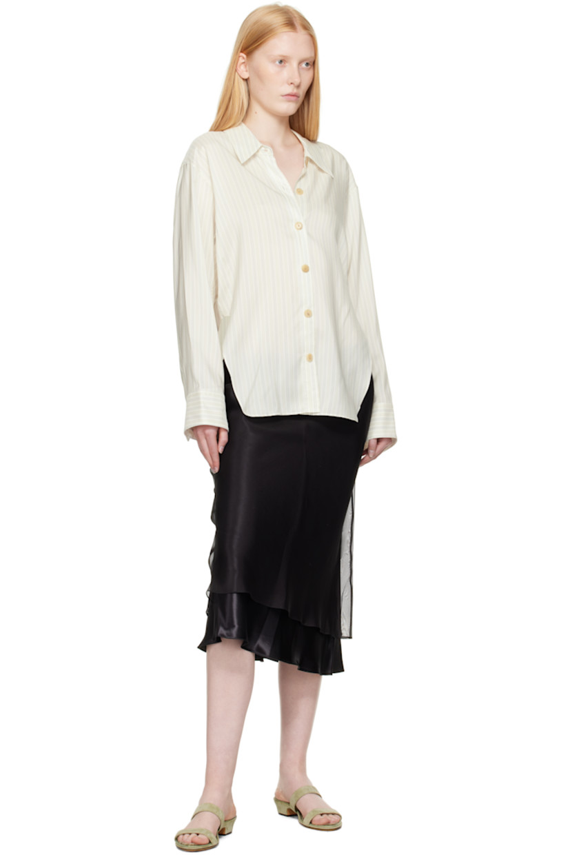 Bias-cut viscose satin midi skirt. Silk organza overlay.

· Layered construction 
· Elasticized waistband 

Supplier color: Black