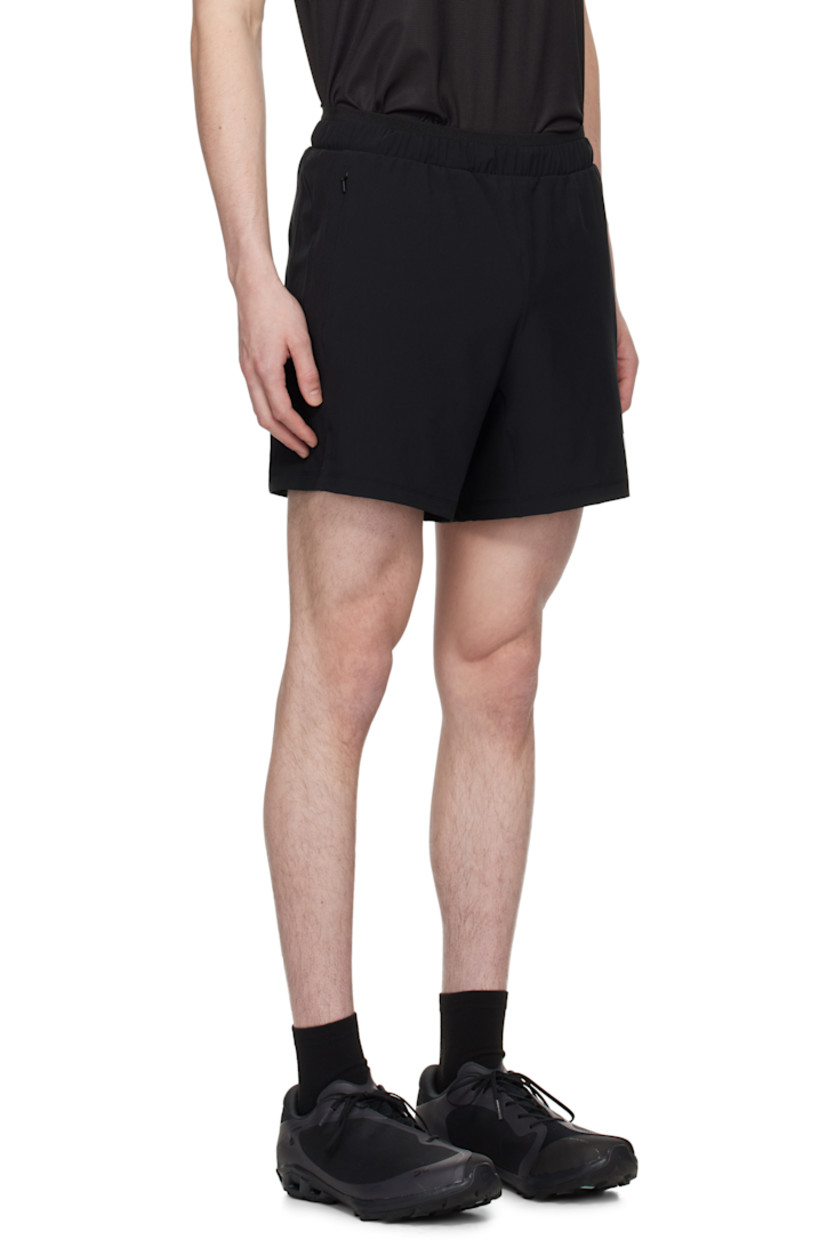 Lightweight stretch polyester jersey shorts. Moisture-wicking.

· Concealed drawstring at elasticized waistband
· Two-pocket styling
· Logo bonded at front and back
· Vented outseams
· Patch pocket at back waistband
· Briefs-style stretch jersey underlay

Supplier color: Black