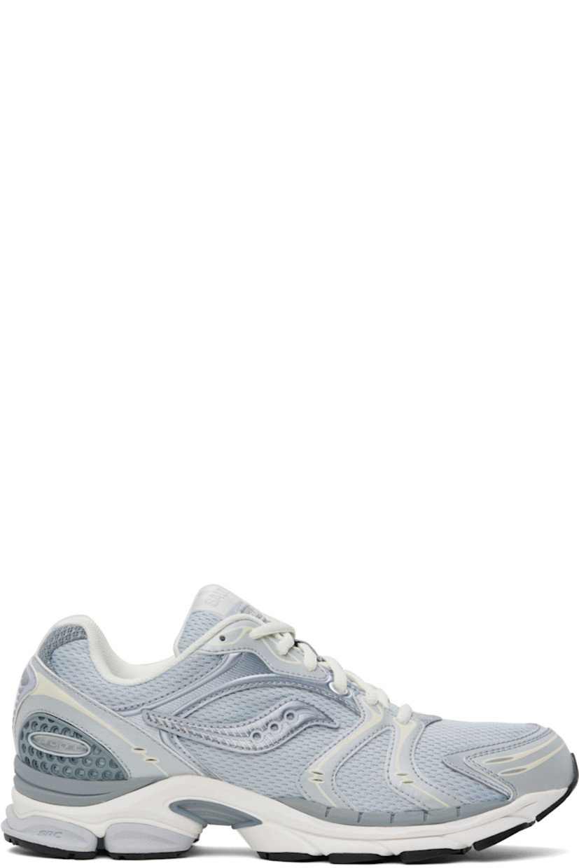 Low-top mesh and textured faux-leather sneakers in gray.

· Rubberized and bonded trim throughout
· Reflective trim at toe
· Lace-up closure
· Logo patch at padded tongue
· Padded collar
· Logo appliqué at sides
· Arch-Lock technology at footbed
· Mesh lining
· ProGrid foam rubber midsole
· Treaded XT-900 rubber sole

Supplier color: Light grey