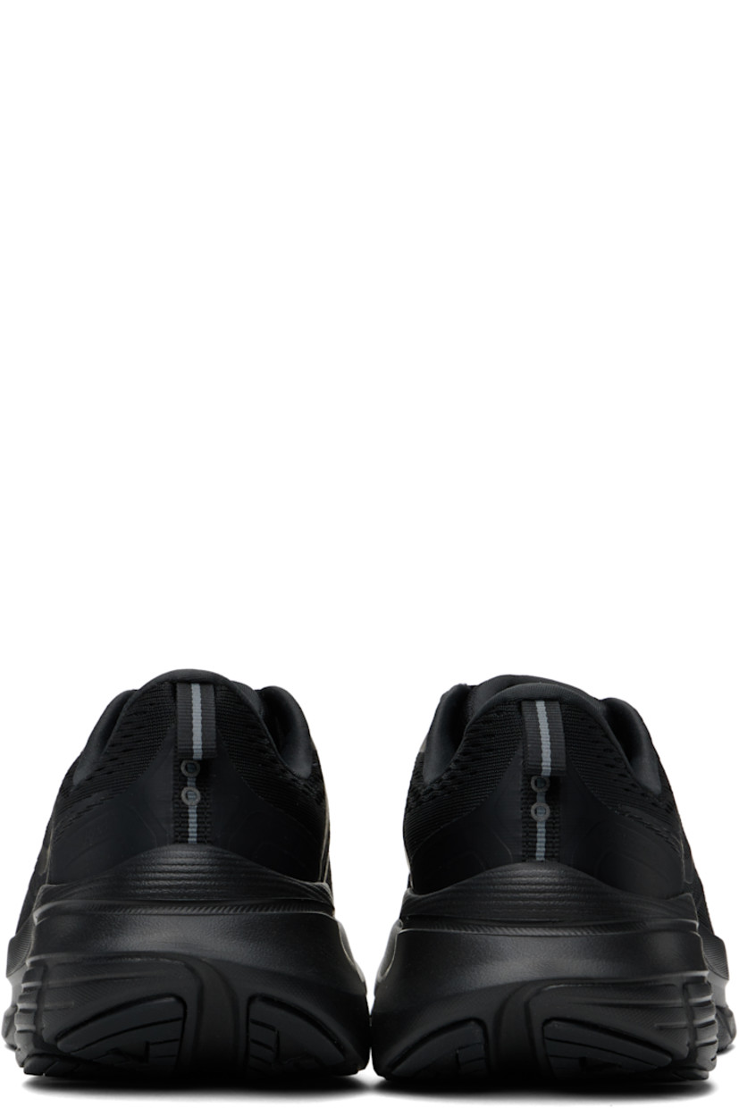 Low-top mesh sneakers in black.

· Reflective trim at toe and heel
· Lace-up closure
· Logo-printed pull-loop at padded tongue
· Padded collar
· Logo bonded at sides
· Pull-loop at heel collar
· Jersey and mesh lining
· PWRRUN foam rubber midsole
· CenterPath Technology at treaded rubber sole

Supplier color: Triple black