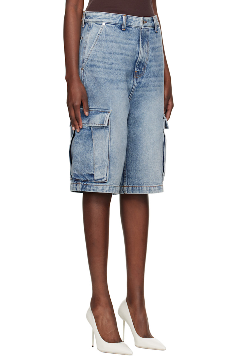 Non-stretch denim cargo shorts. Fading and whiskering throughout.

· Belt loops
· Four-pocket styling
· Zip fly
· Cargo pocket at outseams
· Logo patch at back waistband

Supplier color: Bay indigo