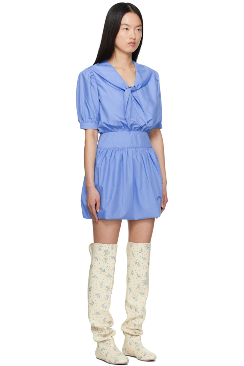 Cotton poplin minidress. Gathering throughout.

· Self-tie fastening at sailor collar
· Button fastening at cuffs
· Zip closure at back

Supplier color: Blue