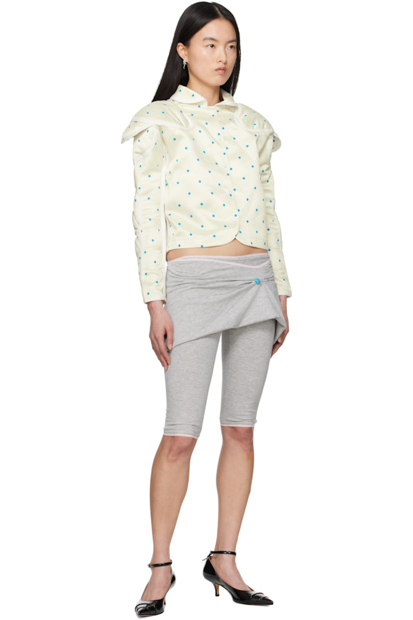 Nylon satin blazer. Polka-dot pattern printed throughout.

· Peter Pan collar
· Press-stud closure
· Vent at underarms
· Layered padded panels at raglan sleeves
· Unlined

Supplier color: Polka dots