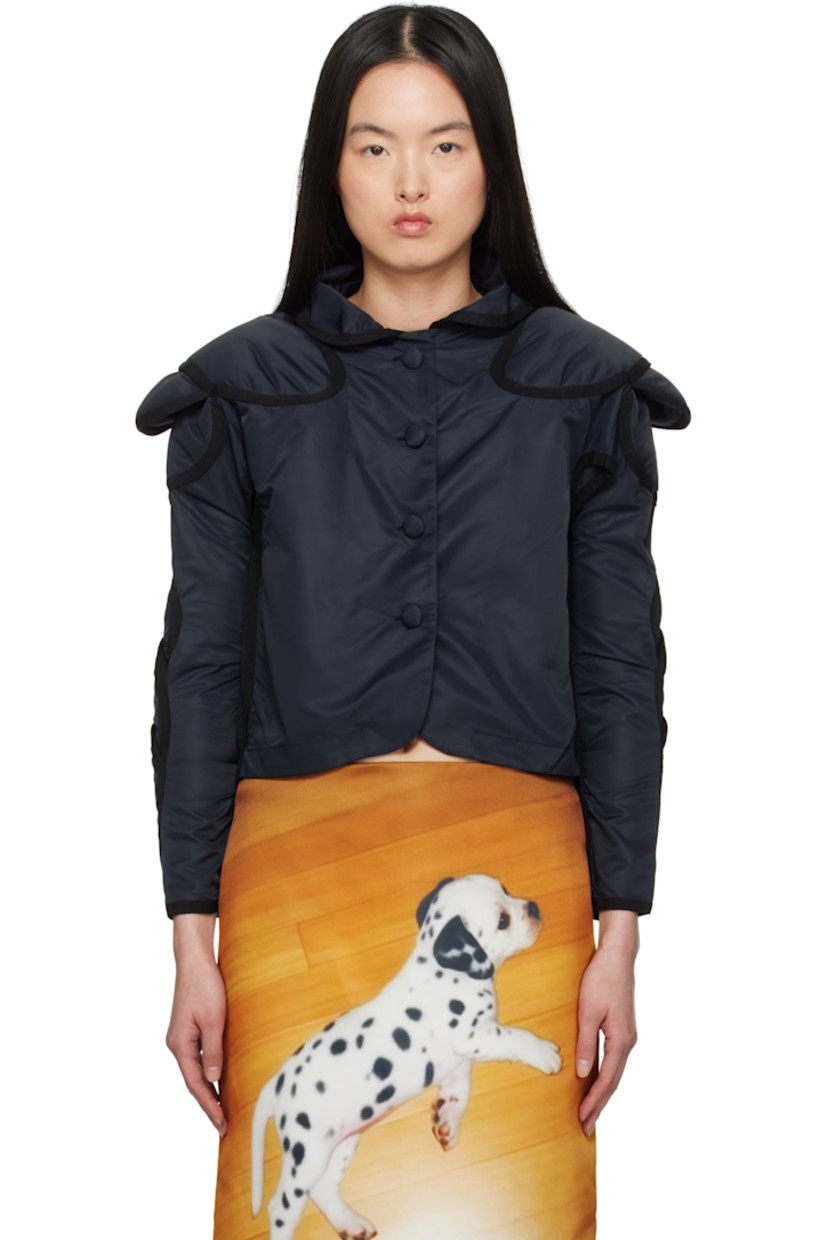 Nylon taffeta blazer.

· Peter Pan collar
· Button closure
· Vent at underarms
· Layered padded panels at raglan sleeves
· Unlined

Supplier color: Black