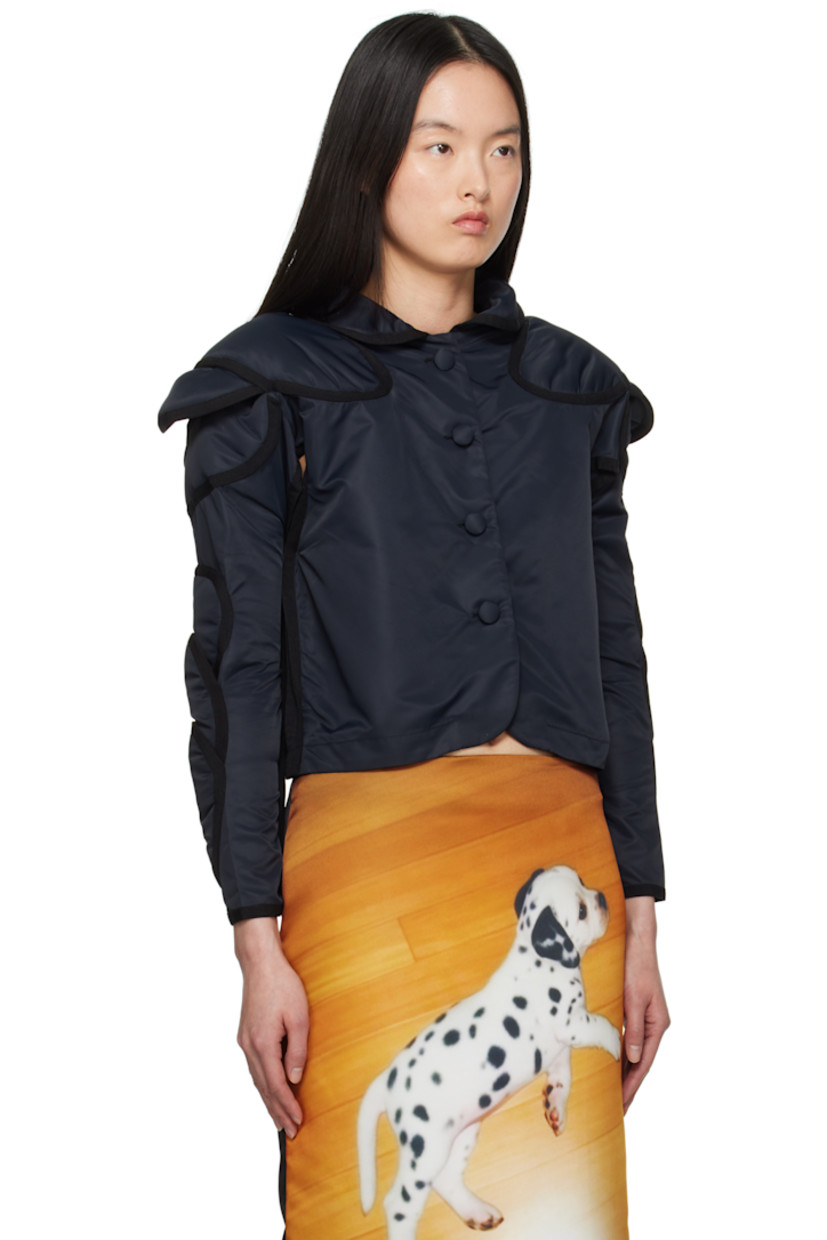 Nylon taffeta blazer.

· Peter Pan collar
· Button closure
· Vent at underarms
· Layered padded panels at raglan sleeves
· Unlined

Supplier color: Black