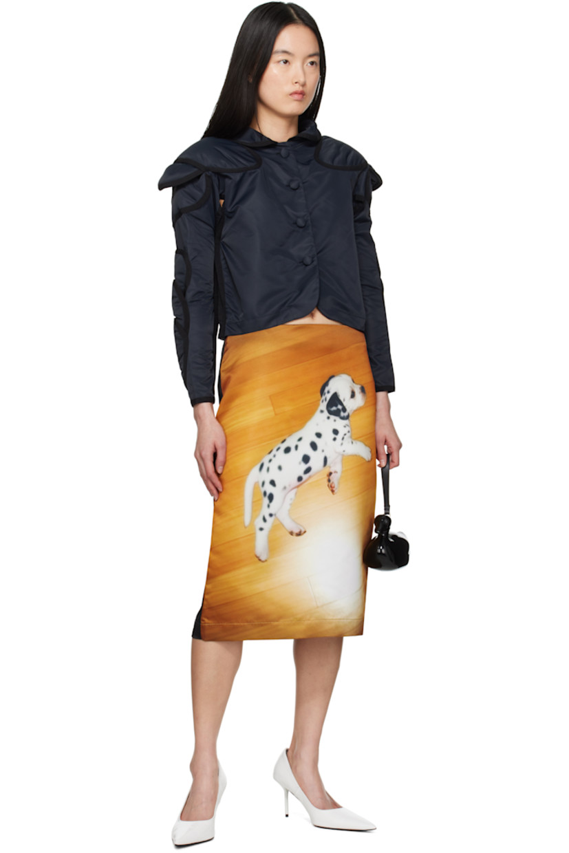Nylon taffeta blazer.

· Peter Pan collar
· Button closure
· Vent at underarms
· Layered padded panels at raglan sleeves
· Unlined

Supplier color: Black