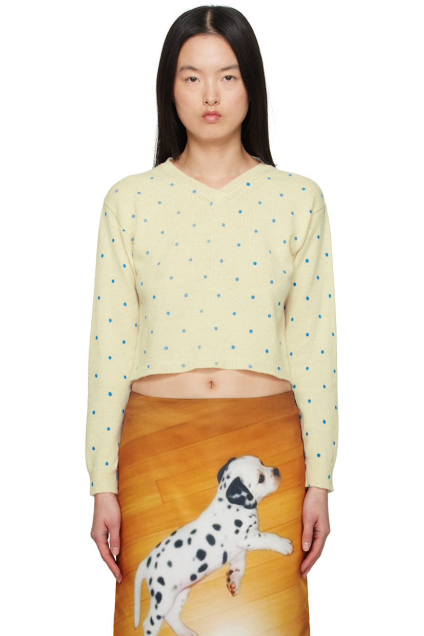 Knit merino lambswool sweater. Polka-dot pattern printed throughout. 

· Rib-knit V-neck, hem, and cuffs
· Cropped hem
· Dropped shoulders

Supplier color: Polka dots