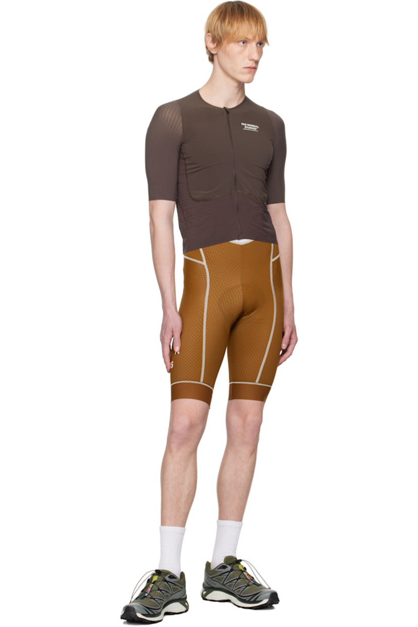 Stretch nylon-blend jersey T-shirt.

· Paneled construction
· Crewneck
· Zip closure
· Logo printed at chest 
· Overlock stitching at front and back
· Laser-cut detailing at sleeves
· Patch pockets and logo flag at back
· Anti-slip trim at interior hem

Supplier color: Light brown