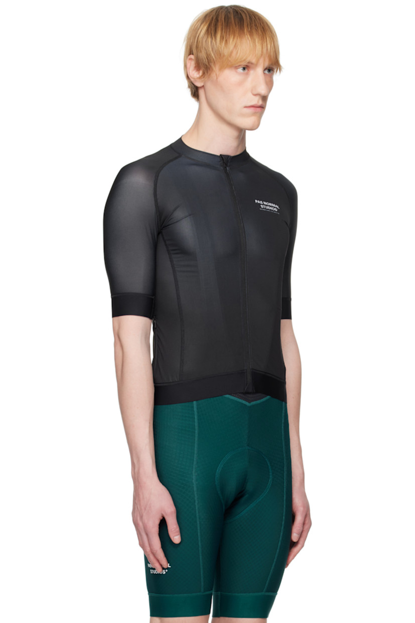 Lightweight stretch polyester jersey and mesh T-shirt. Overlock stitching throughout. 

· Paneled construction
· Band collar
· Zip closure
· Logo printed at chest and back
· Anti-slip silicone trim at elasticized hem and cuffs
· Zip seam pocket
· Logo flag at side seam
· Raglan sleeves
· Patch pockets at back

Supplier color: Black