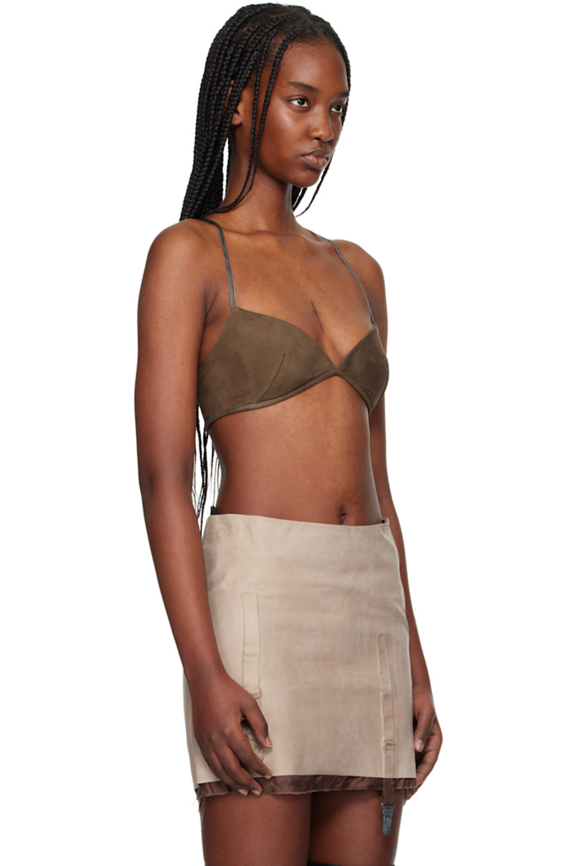 Handcrafted nubuck bra.

· V-neck
· Darts at chest 
· Padded cups
· Adjustable crisscrossing shoulder straps
· Elasticized and adjustable hook-eye closure at back
· Full silk satin lining 

Supplier color: Mud