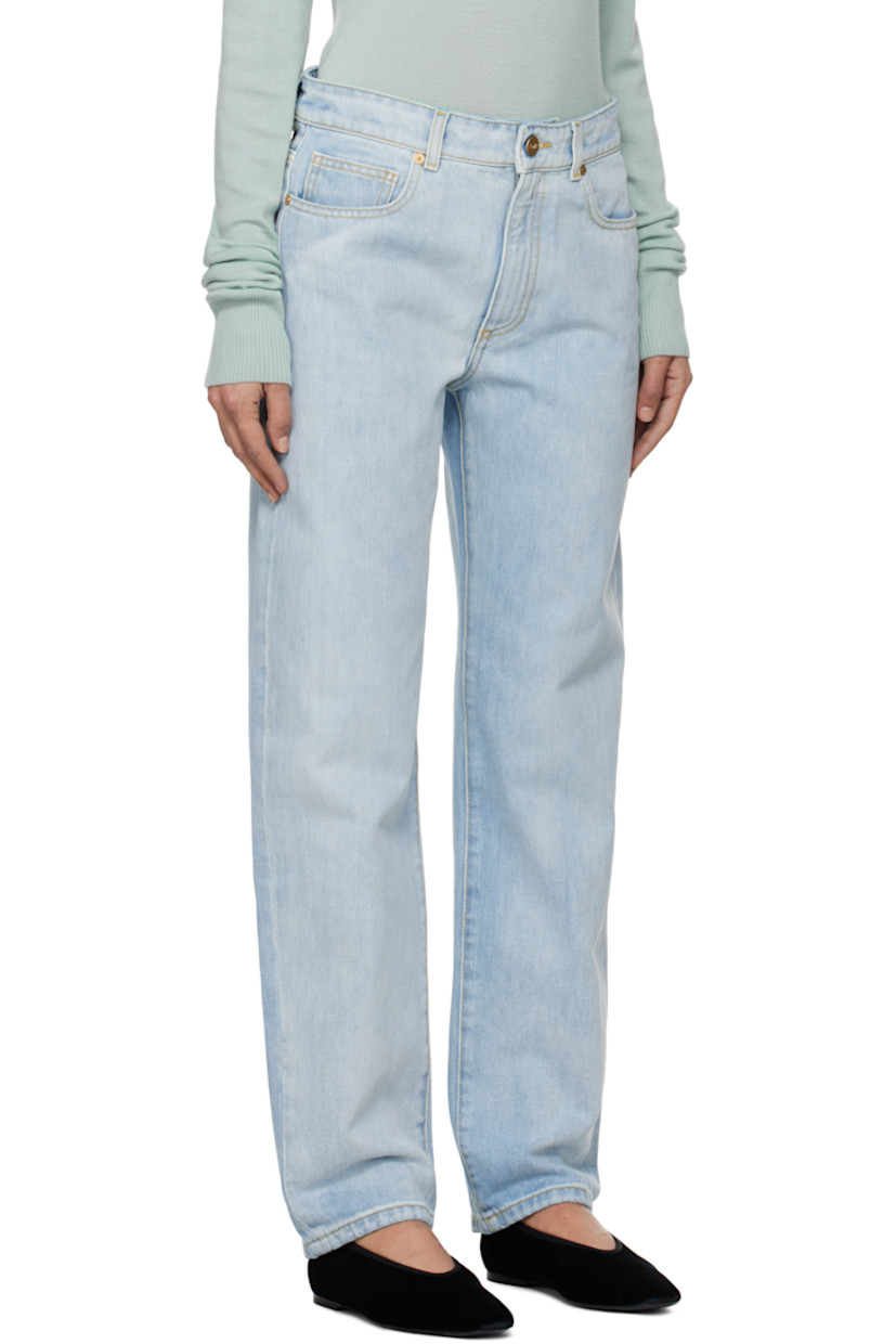 Non-stretch recycled cotton-blend denim jeans.

· Mid-rise
· Belt loops
· Five-pocket styling
· Zip fly
· Leather logo patch at back waistband 
· Contrast stitching in yellow

Supplier color: Light blue
