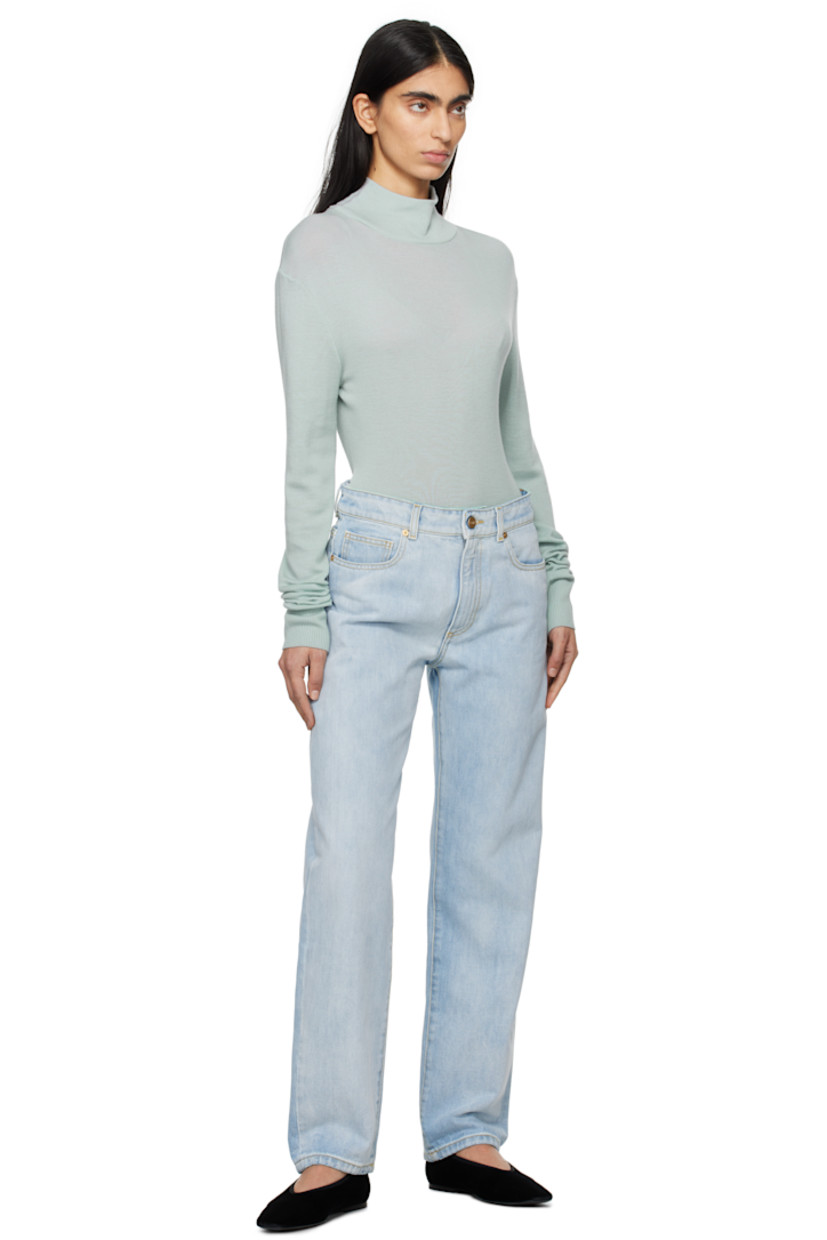 Non-stretch recycled cotton-blend denim jeans.

· Mid-rise
· Belt loops
· Five-pocket styling
· Zip fly
· Leather logo patch at back waistband 
· Contrast stitching in yellow

Supplier color: Light blue