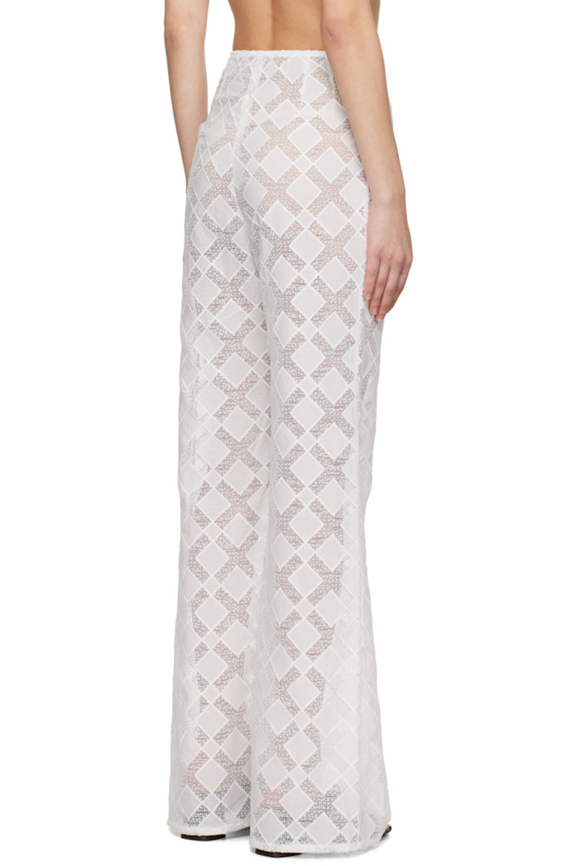 Semi-sheer nylon- and cotton-blend voile trousers. 

· Loose-fit
· Concealed grosgrain trim at waistband
· Concealed zip closure at side

Supplier color: White