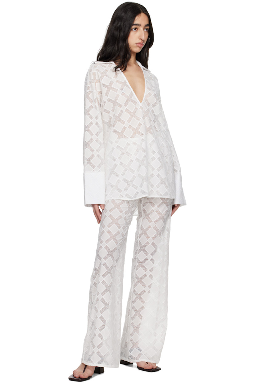 Semi-sheer nylon- and cotton-blend voile trousers. 

· Loose-fit
· Concealed grosgrain trim at waistband
· Concealed zip closure at side

Supplier color: White