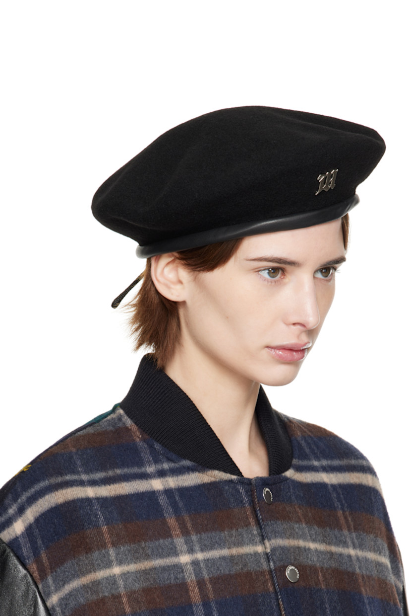 Felted wool cap in black.

· Rigid crown
· Logo hardware at face
· Cord-lock drawstring at back face
· Faux-leather trim at brim
· Logo-woven satin lining

Supplier color: Black
