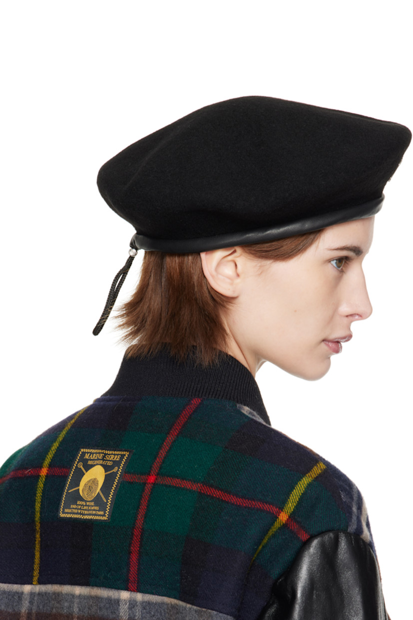 Felted wool cap in black.

· Rigid crown
· Logo hardware at face
· Cord-lock drawstring at back face
· Faux-leather trim at brim
· Logo-woven satin lining

Supplier color: Black