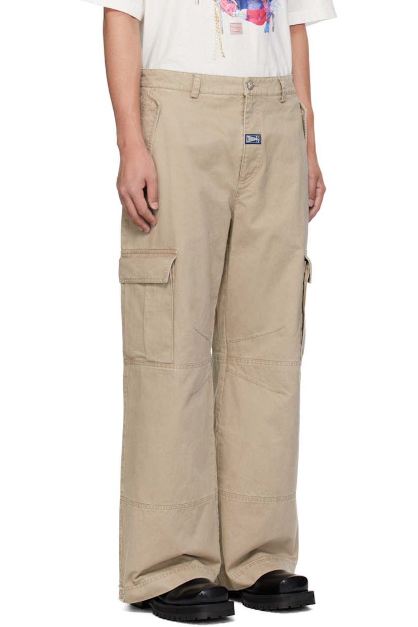 Cotton twill cargo pants. Fading throughout.

· Belt loops
· Four-pocket styling
· Zip-fly
· Logo patch at front
· Metal eyelets at cuffs
· Cargo pocket at outseams

Supplier color: Beige