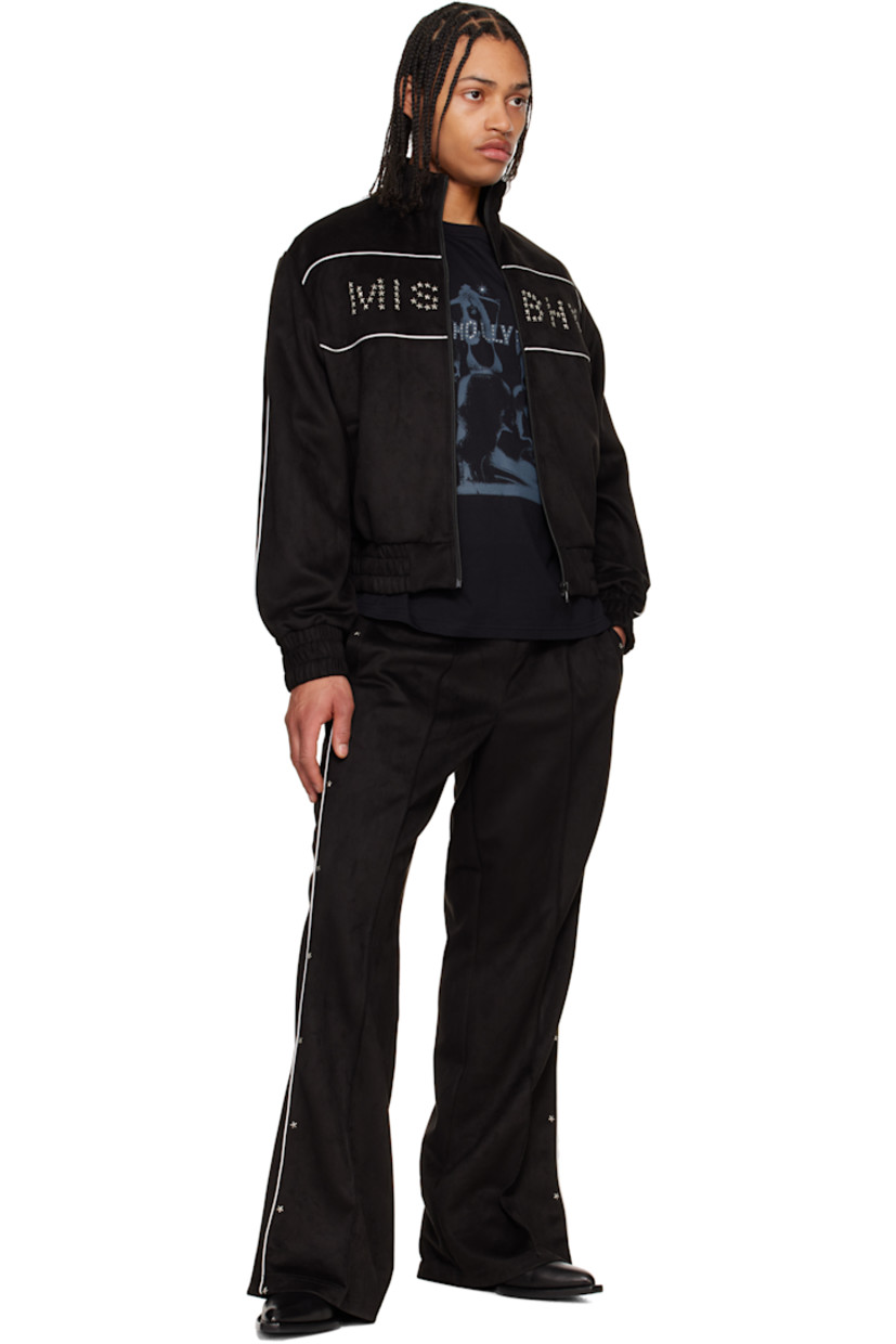 Stretch faux-suede track jacket. Piping throughout.

· Elasticized stand collar, hem, and cuffs
· Zip closure
· Studded logo at chest
· Welt pockets
· Welt pocket at interior
· Full satin lining

Supplier color: Black