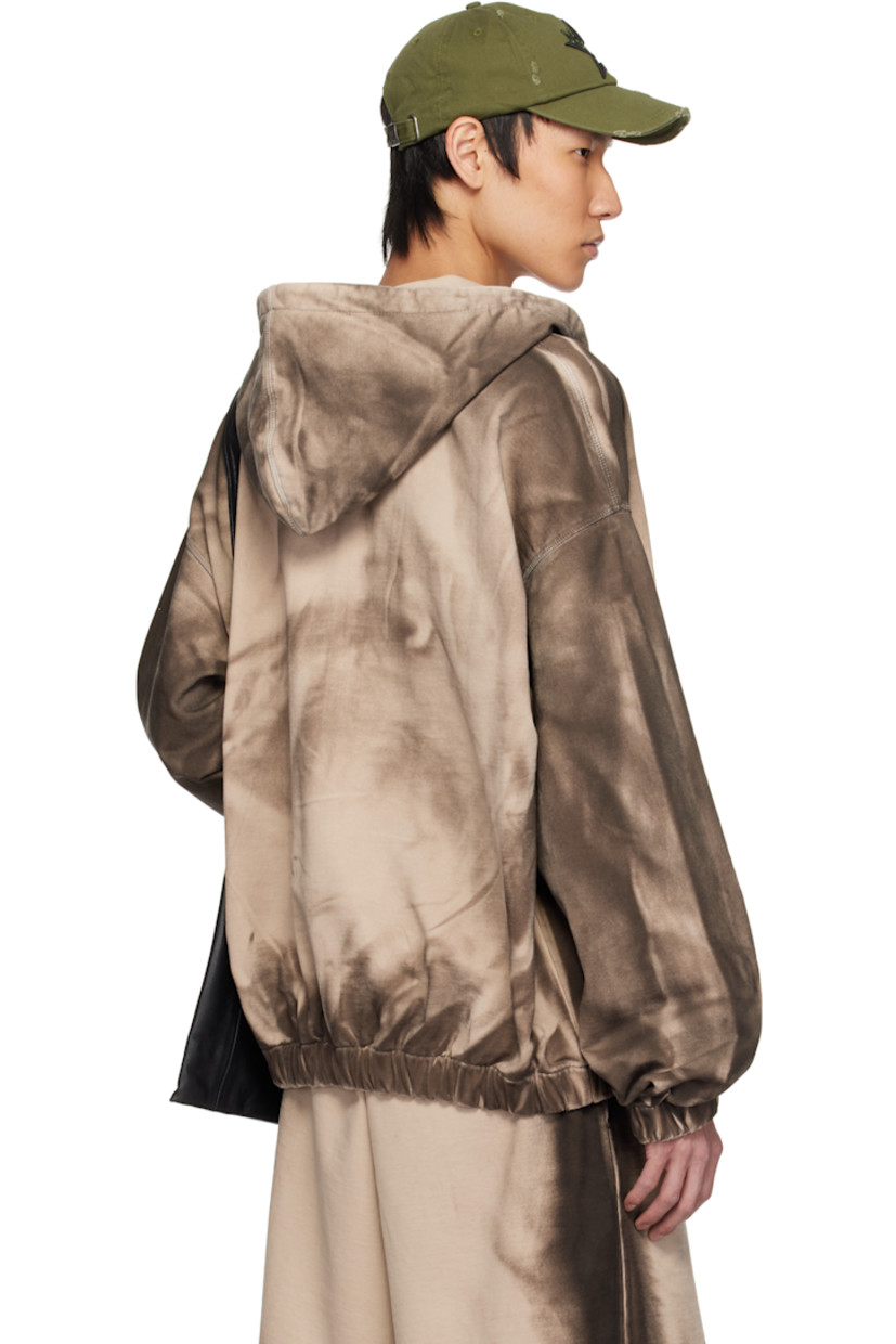 Heavyweight French terry hoodie. Fading throughout.

· Zip closure
· Logo graphic printed at chest
· Patch pockets
· Elasticized hem and cuffs
· Dropped shoulders

Each item is unique. Please note coloration may vary.

Supplier color: Beige