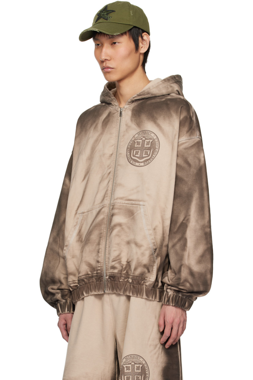 Heavyweight French terry hoodie. Fading throughout.

· Zip closure
· Logo graphic printed at chest
· Patch pockets
· Elasticized hem and cuffs
· Dropped shoulders

Each item is unique. Please note coloration may vary.

Supplier color: Beige