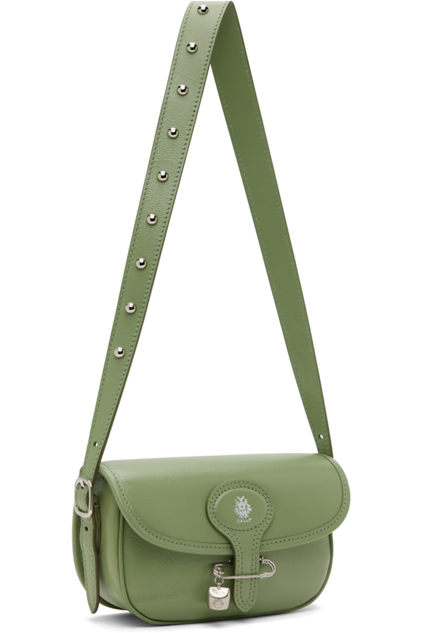 Grained buffalo leather shoulder bag in green.

· Adjustable and detachable studded shoulder strap
· Adjustable and detachable crossbody strap
· Silver-tone logo stamp at face
· Patch pocket at back face
· Safety pin and logo charm at tab-slot flap
· Magnetic closure
· Patch pocket at interior
· Faille lining
· Logo-engraved silver-tone hardware
· H5" x W7.5" x D2"

Supplier color: Oil green