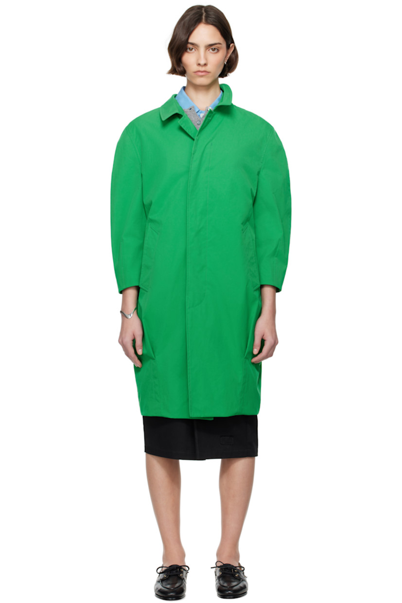 Polyester twill coat.

· Spread collar
· Concealed button closure
· Welt pockets
· Darts at front and back
· Concealed button tab at front hem
· Adjustable button tab at cuffs
· Zip pocket at interior
· Full plain-woven lining

Supplier color: Fern green
