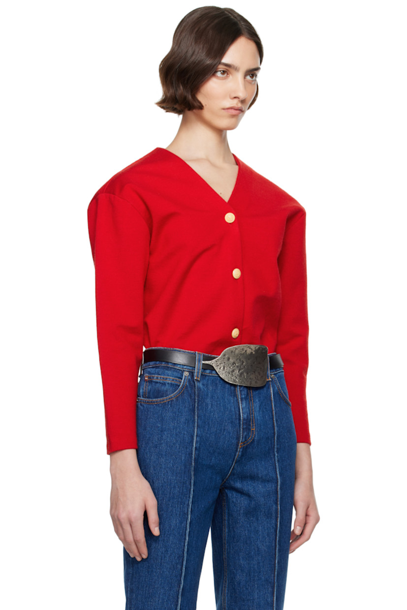 Knit stretch polyester- and wool-blend cardigan.

· Structured
· V-neck
· Button closure
· Laminated coating at interior 
 
Supplier color: Swiss red 50