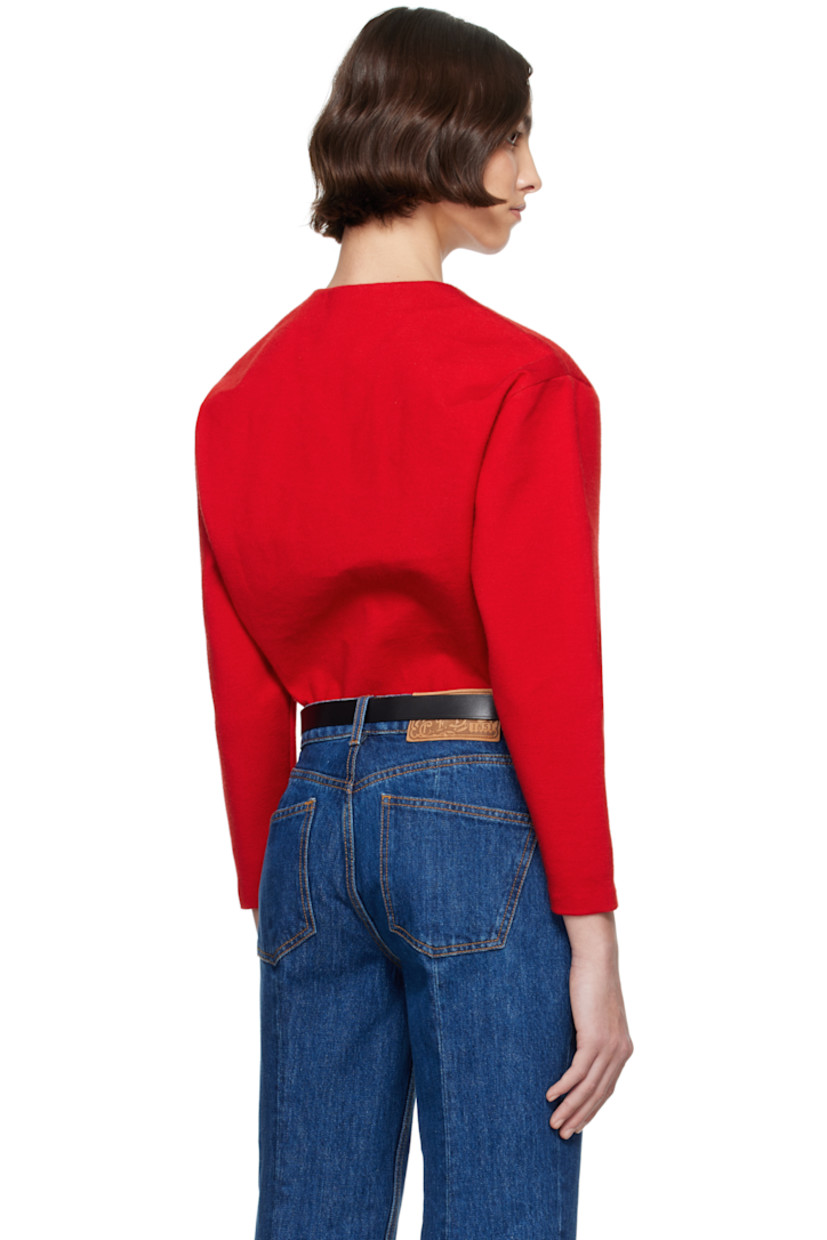 Knit stretch polyester- and wool-blend cardigan.

· Structured
· V-neck
· Button closure
· Laminated coating at interior 
 
Supplier color: Swiss red 50