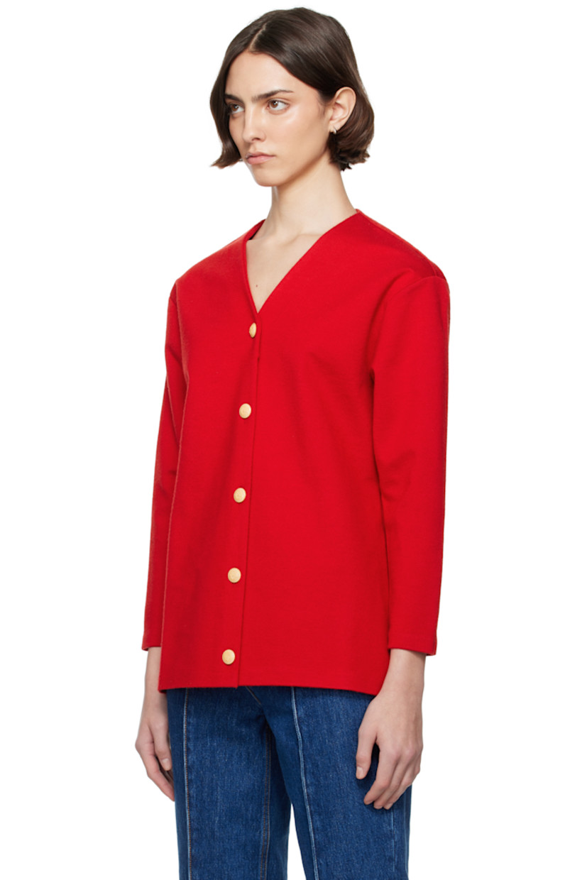 Knit stretch polyester- and wool-blend cardigan.

· Structured
· V-neck
· Button closure
· Laminated coating at interior 
 
Supplier color: Swiss red 50