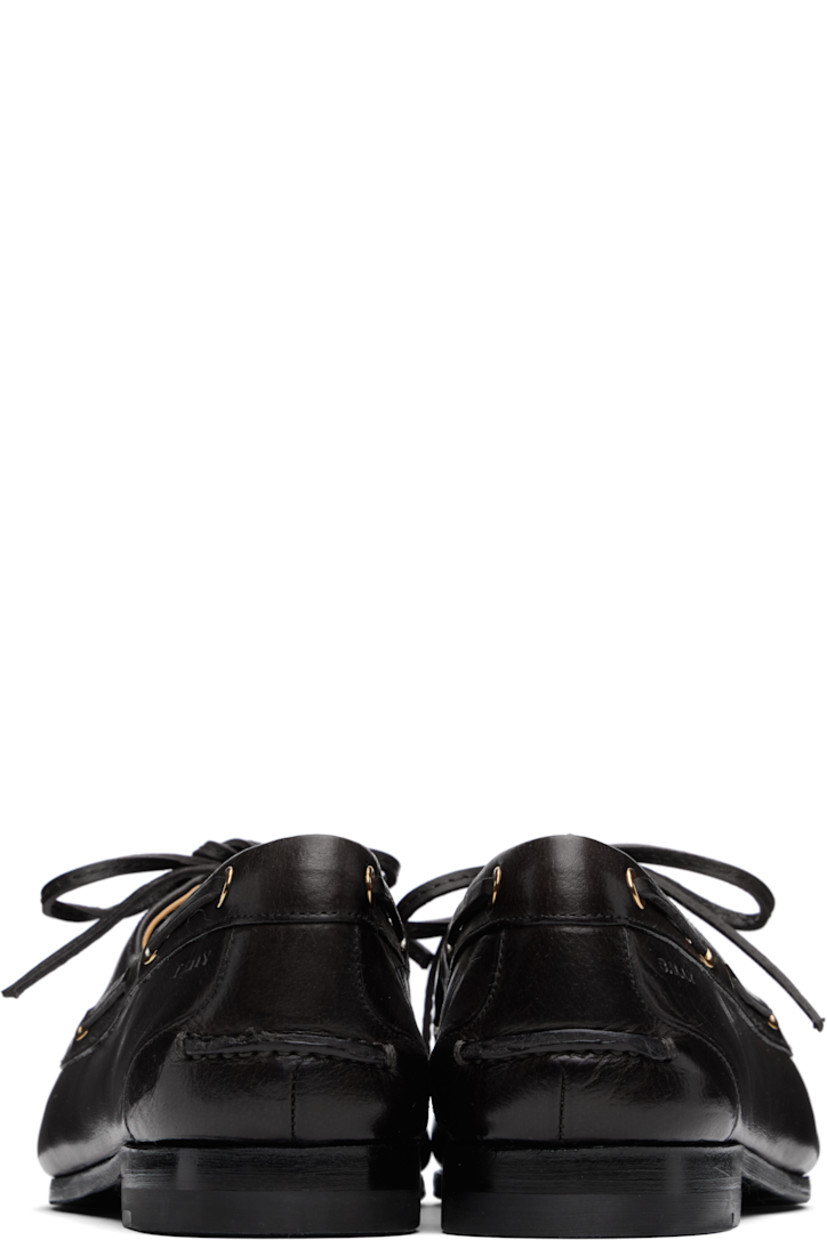 Buffed buffalo leather derbys in black.

· Almond moc toe
· Lace-up closure 
· Lace-up detailing at collar
· Logo embossed at outer side
· Pinched seam at heel counter
· Reverse Goodyear welt construction
· Buffed leather and suede lining
· Stacked leather heel with rubber injection
· Textured leather sole

Supplier color: Black