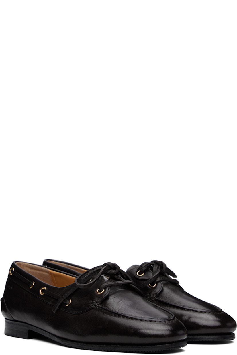 Buffed buffalo leather derbys in black.

· Almond moc toe
· Lace-up closure 
· Lace-up detailing at collar
· Logo embossed at outer side
· Pinched seam at heel counter
· Reverse Goodyear welt construction
· Buffed leather and suede lining
· Stacked leather heel with rubber injection
· Textured leather sole

Supplier color: Black