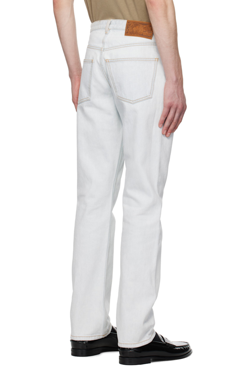 Non-stretch denim jeans. Fading throughout.

· Belt loops
· Five-pocket styling
· Zip fly
· Leather logo patch at back waistband
· Logo-engraved silver-tone hardware
· Contrast stitching in tan

Supplier color: Light blue
