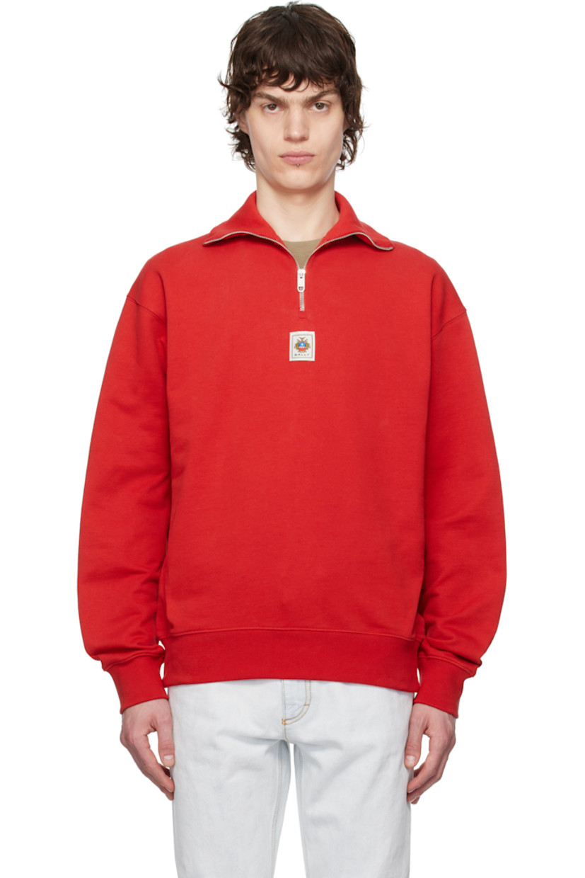 Organic cotton French terry sweatshirt. 

· Rib-knit stand collar, hem, and cuffs
· Half-zip closure
· Logo patch at chest
· Dropped shoulders

Supplier color: Swiss red